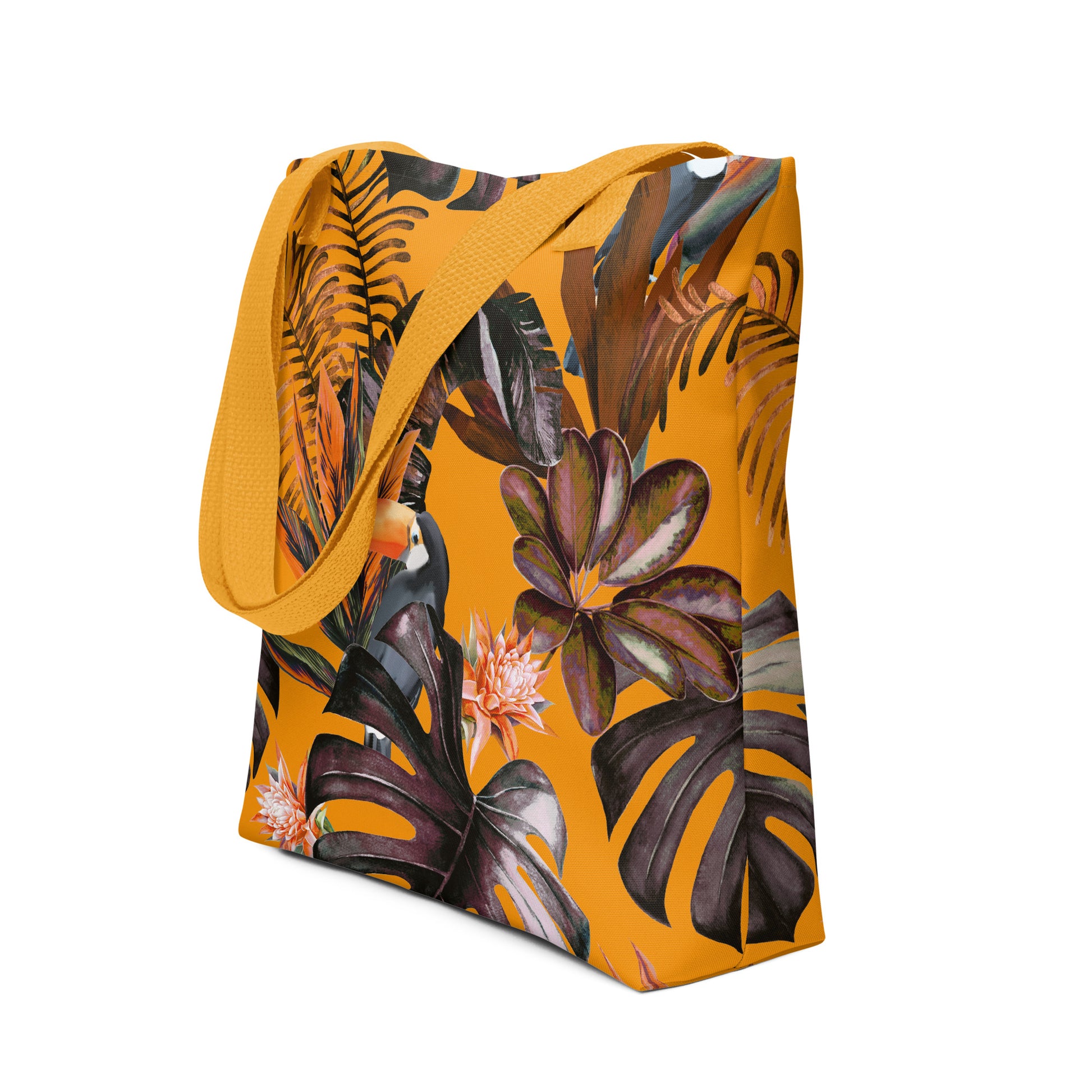 Bolso tote con diseño de tucán y asas naranjas sobre fondo blanco

