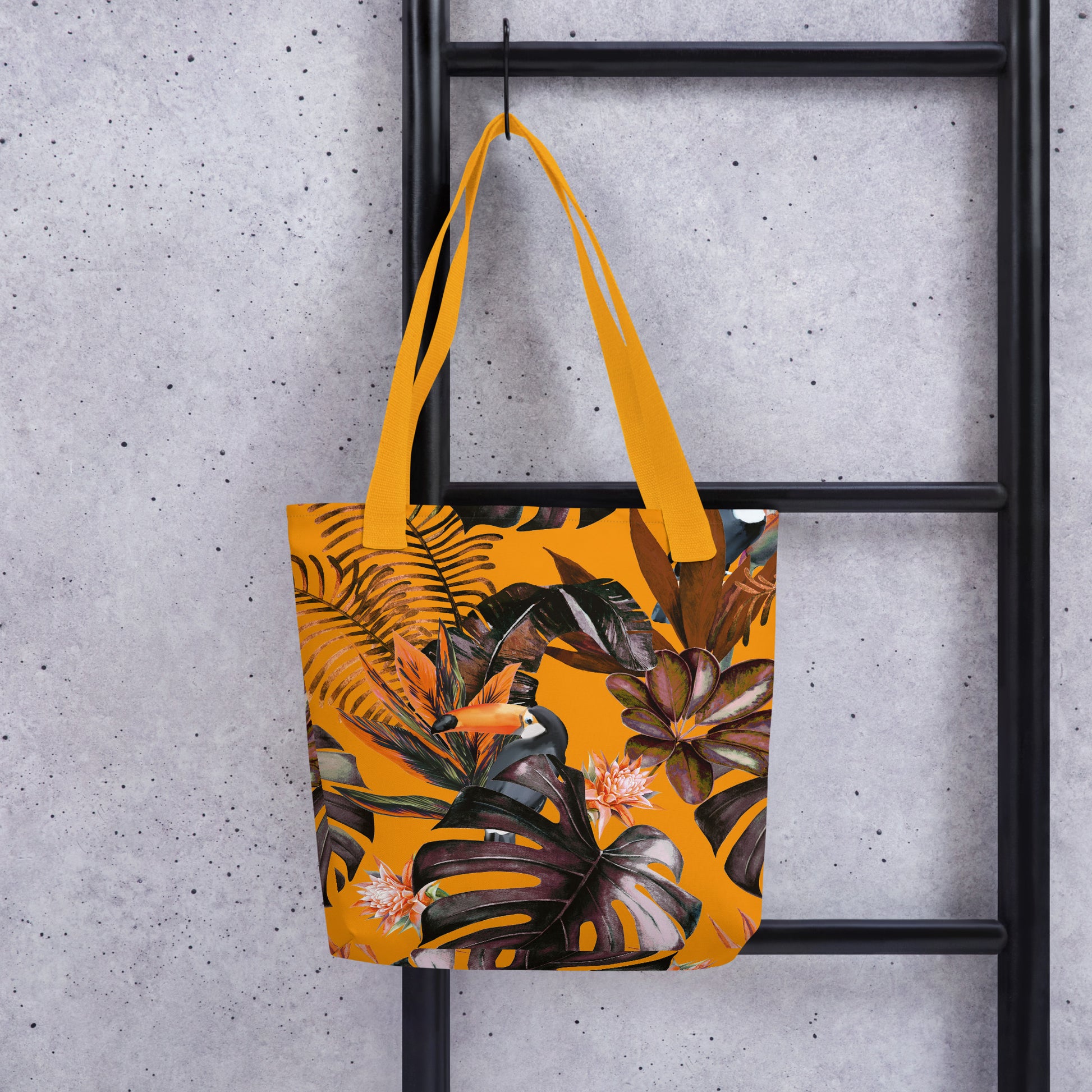 Vista frontal del bolso tote tropical con asas largas

