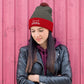 Embroidered hat with kitten pompom