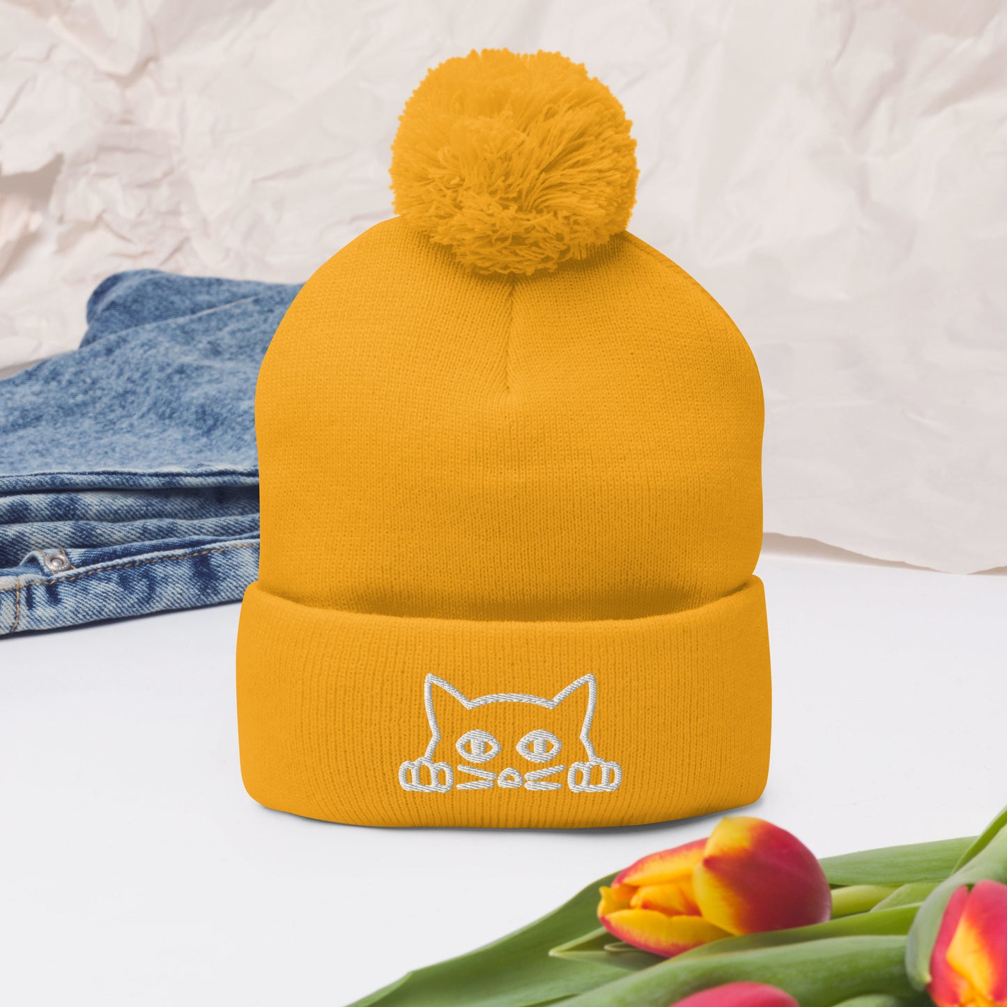 Embroidered hat with kitten pompom