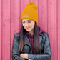 Embroidered hat with kitten pompom
