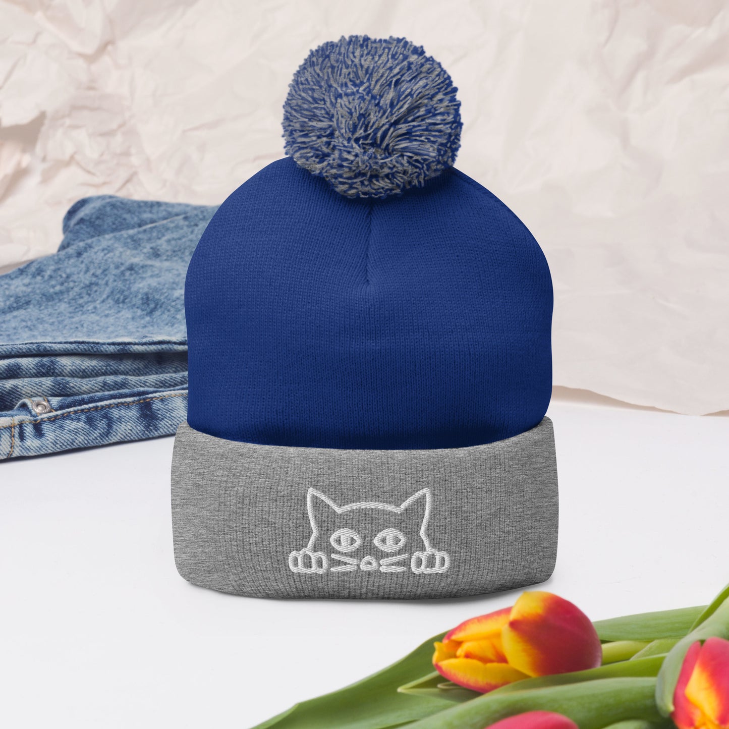 Embroidered hat with kitten pompom