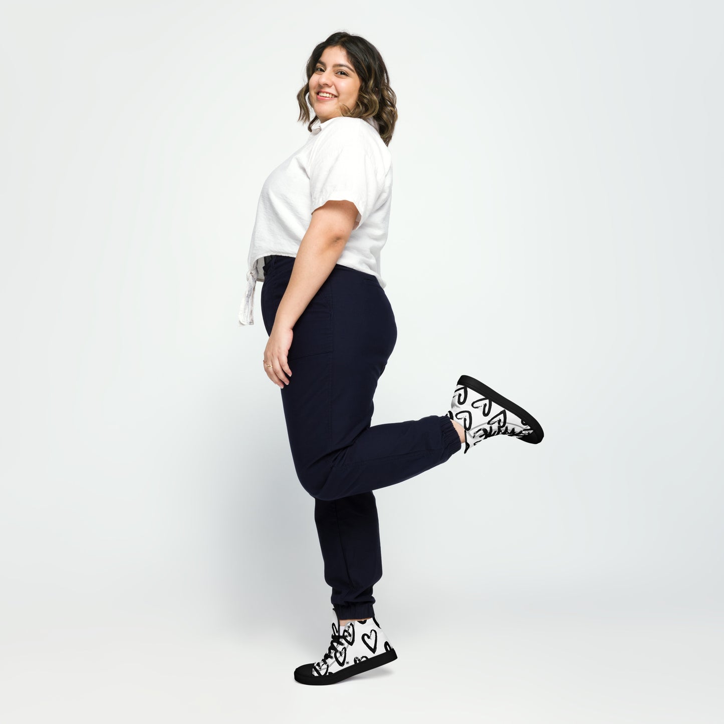 Women's high-top canvas sneakers with black toe hearts